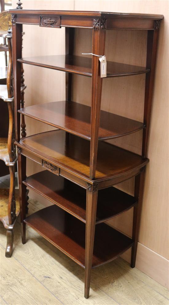 A pair of Regency style mahogany three-tier occasional tables, each inset brown leather skiver W.61cm